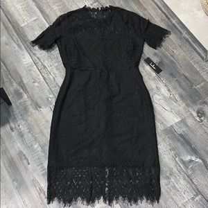 Black lace dress never worn, tags attached